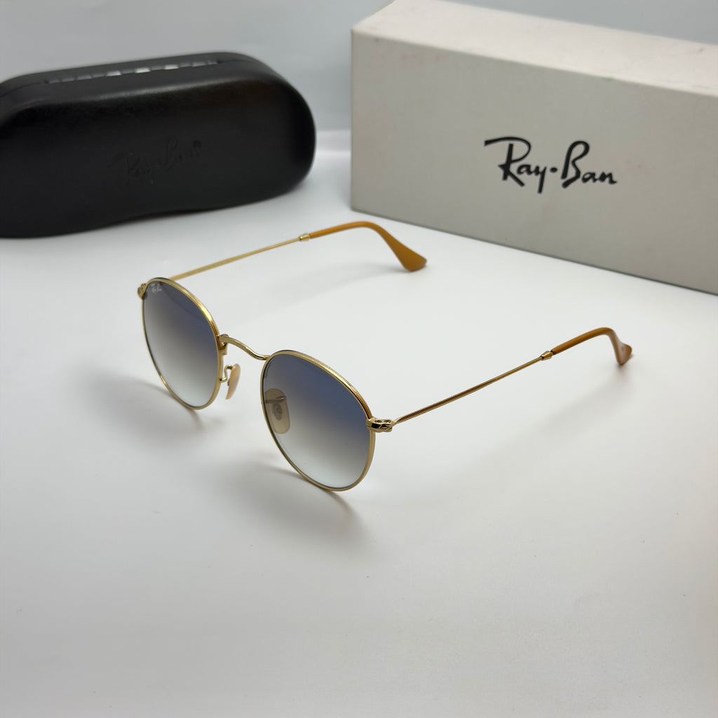 Ray-Ban Round Metal RB3447 – Or & Verres Minéraux Bleu Dégradé