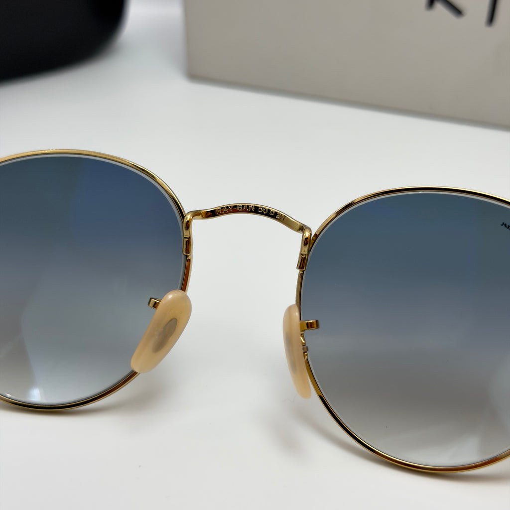 Ray-Ban Round Metal RB3447 – Or & Verres Minéraux Bleu Dégradé