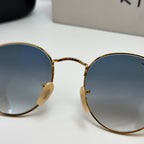 Ray-Ban Round Metal RB3447 – Or & Verres Minéraux Bleu Dégradé
