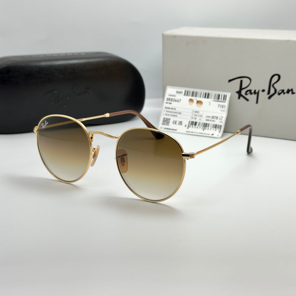 Ray-Ban Round Metal RB3447 – Or & Verres Minéraux Marron Dégradé